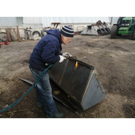 Заміна ножа ковша